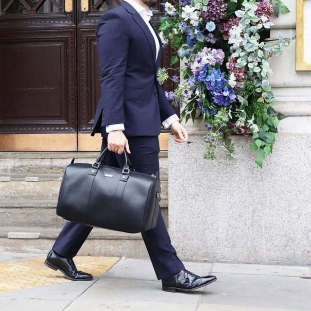 The MAXIM travel bag is a spacious weekend holdall, complete with top handles and a detachable cross-body shoulder strap. Perfect for a weekend away, city break or an addition to your well deserved holiday, the MAXIM travel bag will not let you down. Showcasing class and style throughout its design. 
.
.
.
#riccozano #bag #travel #travelbag #weekend #weekendbag #weekendholdall #holdall #holdallbag #holdal #leather #veganleather #veganleatherbag #city #citybreak #cityoflondon #workbag #klarnauk #clearpay #mensfashion #mens #gifts #giftsforhim #womens #womensfashion #fashion #suit #suitstyle #menfashioncatalogue #mensstyle